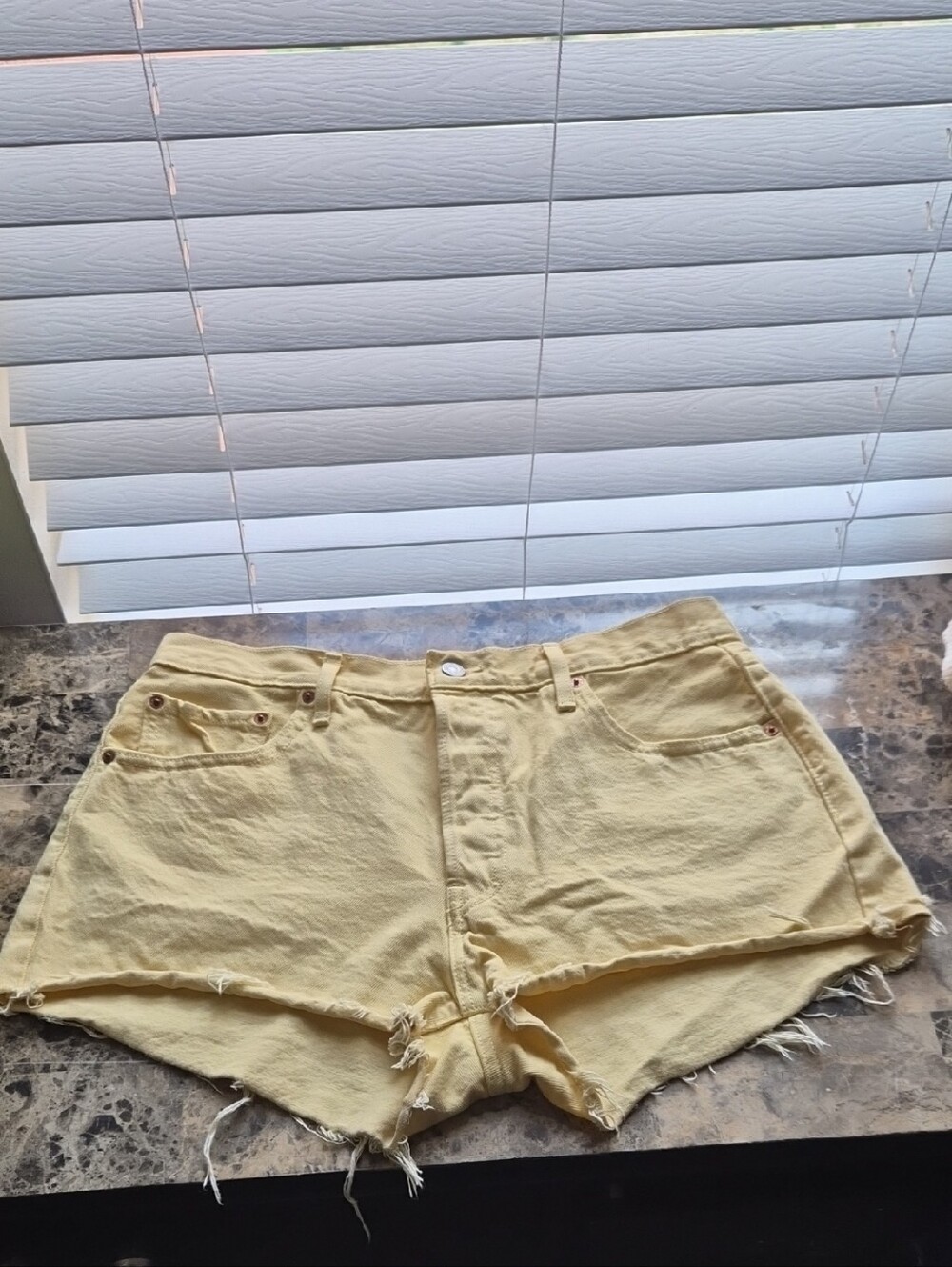 Levi's Pale Yellow Denim Cutoff Shorts